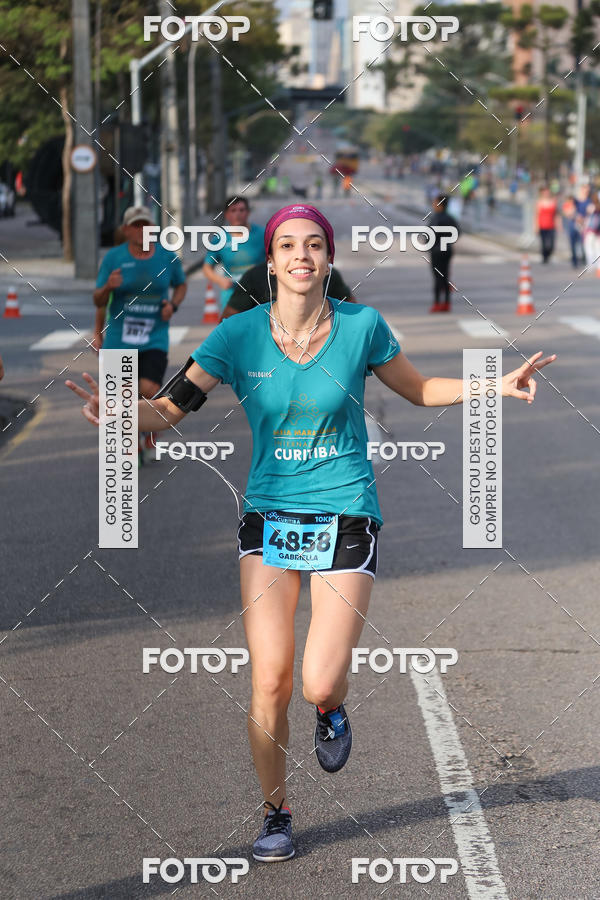 Buy your photos of the eventMeia Maratona Internacional de Curitiba 2018 on Fotop