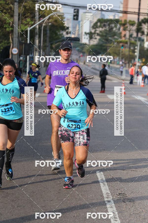 Buy your photos of the eventMeia Maratona Internacional de Curitiba 2018 on Fotop