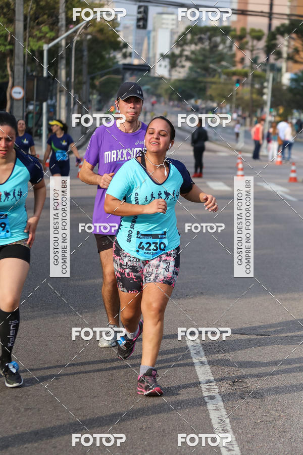 Buy your photos of the eventMeia Maratona Internacional de Curitiba 2018 on Fotop