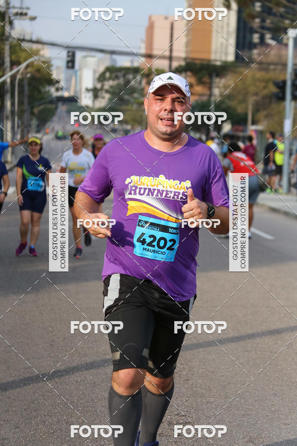 Buy your photos of the eventMeia Maratona Internacional de Curitiba 2018 on Fotop