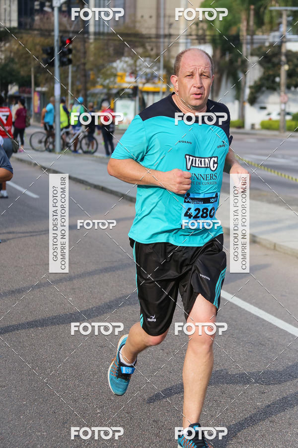 Buy your photos of the eventMeia Maratona Internacional de Curitiba 2018 on Fotop