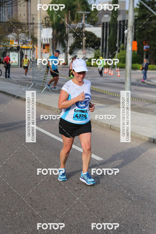 Buy your photos of the eventMeia Maratona Internacional de Curitiba 2018 on Fotop