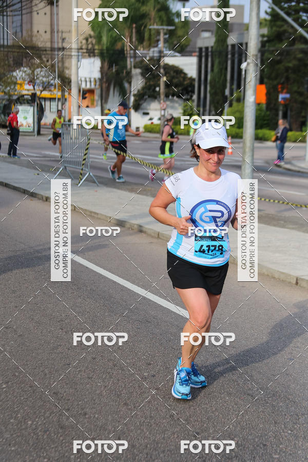 Buy your photos of the eventMeia Maratona Internacional de Curitiba 2018 on Fotop