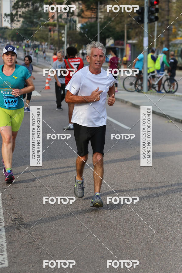 Buy your photos of the eventMeia Maratona Internacional de Curitiba 2018 on Fotop