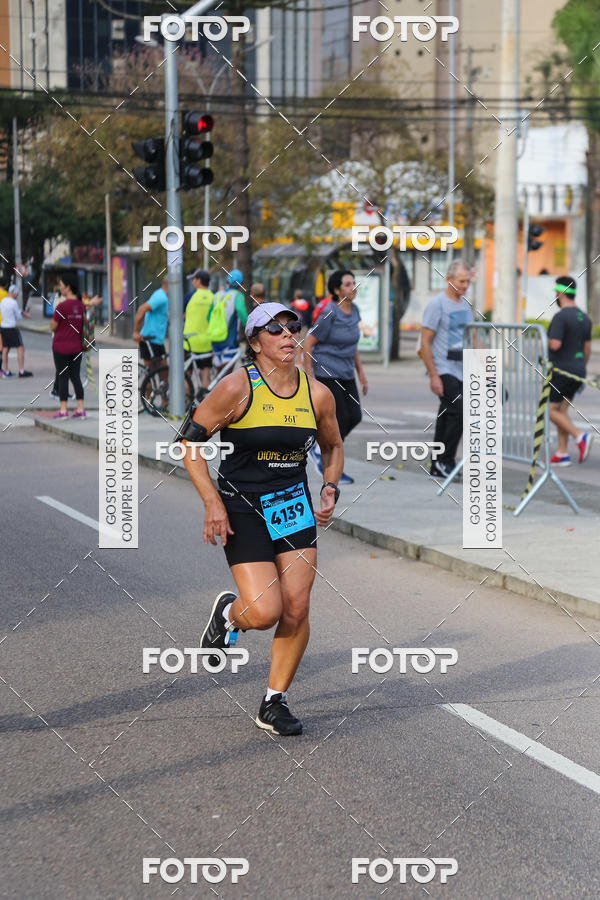 Buy your photos of the eventMeia Maratona Internacional de Curitiba 2018 on Fotop