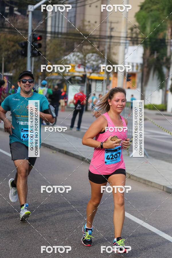 Buy your photos of the eventMeia Maratona Internacional de Curitiba 2018 on Fotop