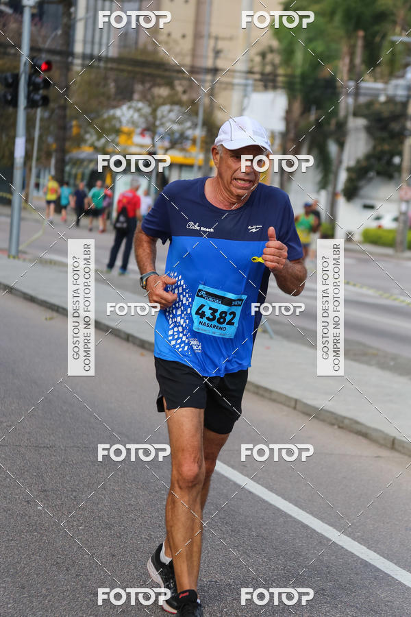 Buy your photos of the eventMeia Maratona Internacional de Curitiba 2018 on Fotop