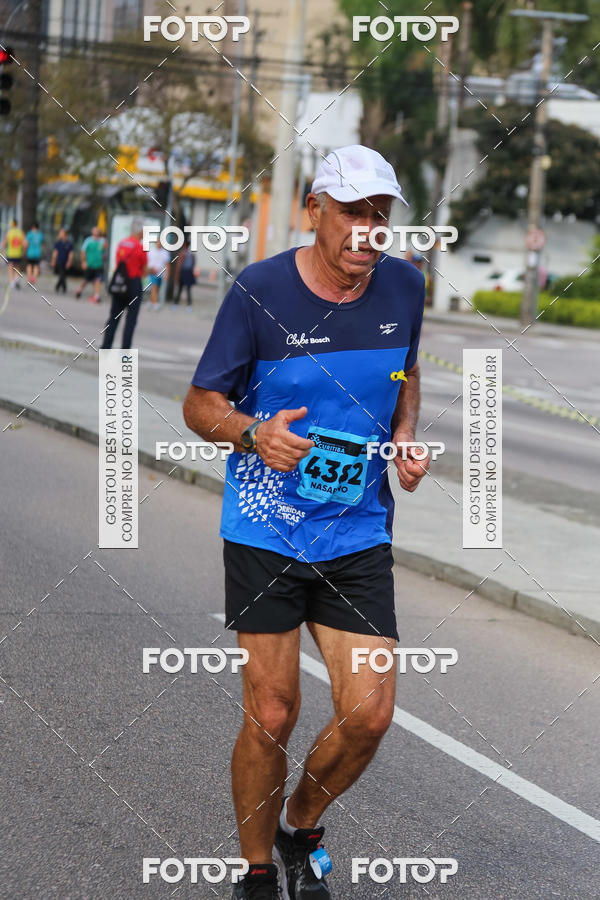Buy your photos of the eventMeia Maratona Internacional de Curitiba 2018 on Fotop