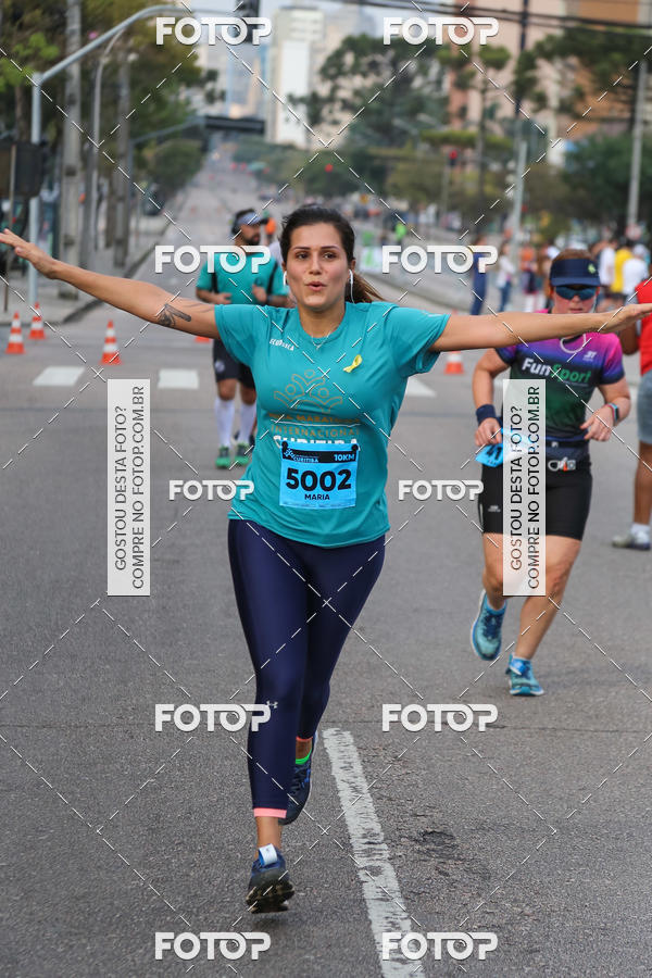 Buy your photos of the eventMeia Maratona Internacional de Curitiba 2018 on Fotop