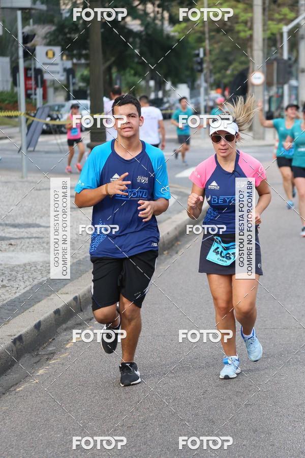 Buy your photos of the eventMeia Maratona Internacional de Curitiba 2018 on Fotop