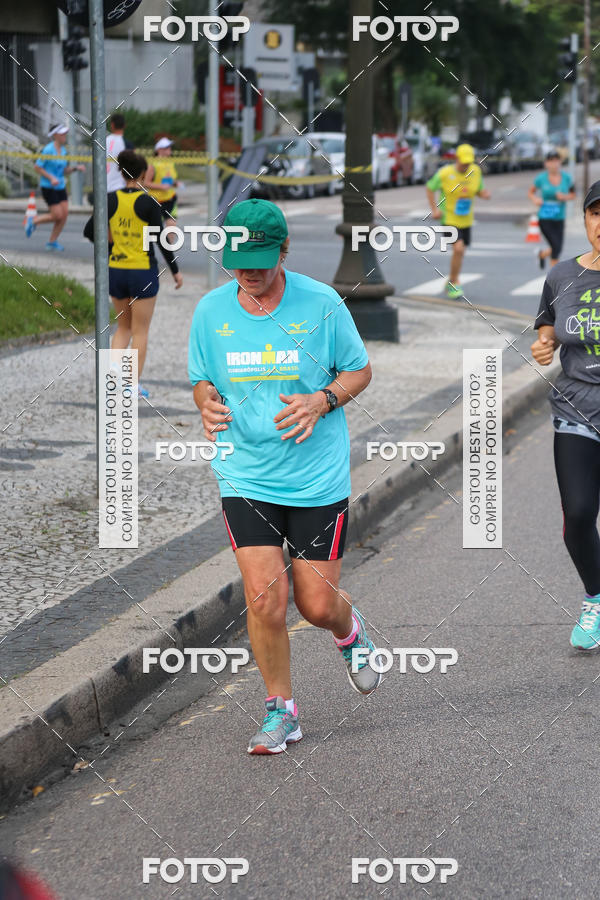 Buy your photos of the eventMeia Maratona Internacional de Curitiba 2018 on Fotop
