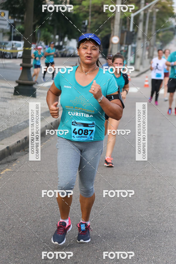 Buy your photos of the eventMeia Maratona Internacional de Curitiba 2018 on Fotop