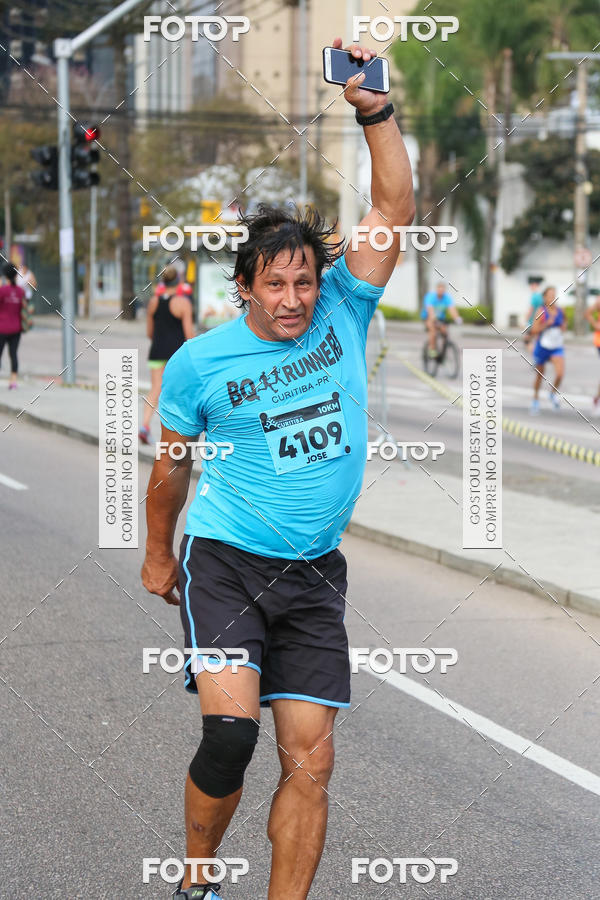 Buy your photos of the eventMeia Maratona Internacional de Curitiba 2018 on Fotop