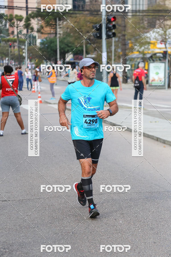 Buy your photos of the eventMeia Maratona Internacional de Curitiba 2018 on Fotop
