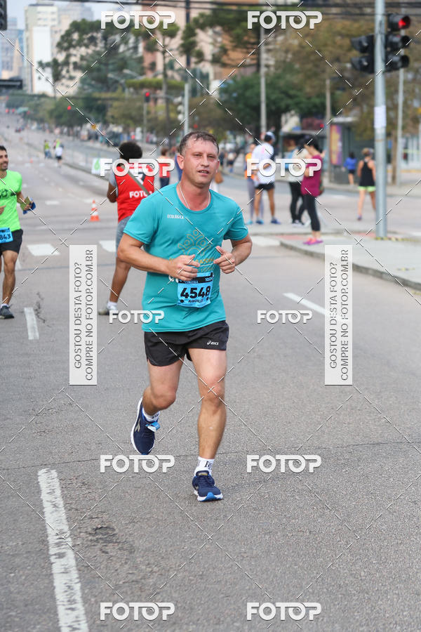 Buy your photos of the eventMeia Maratona Internacional de Curitiba 2018 on Fotop