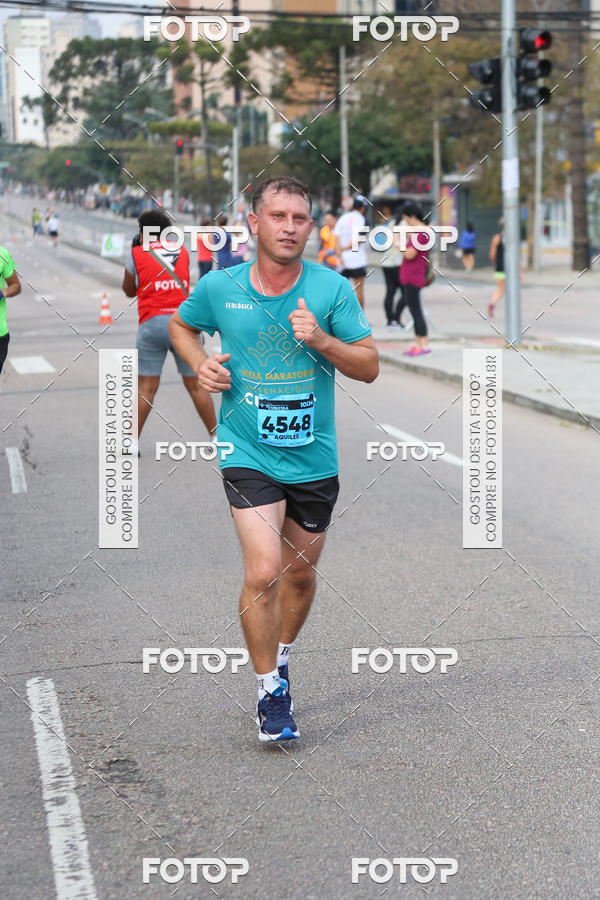 Buy your photos of the eventMeia Maratona Internacional de Curitiba 2018 on Fotop