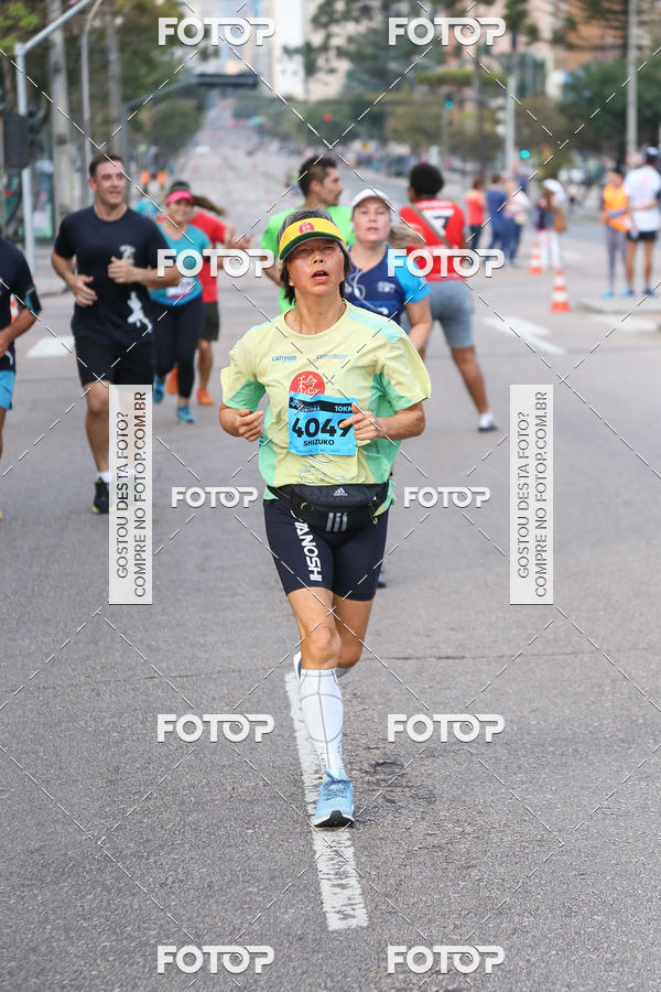 Buy your photos of the eventMeia Maratona Internacional de Curitiba 2018 on Fotop