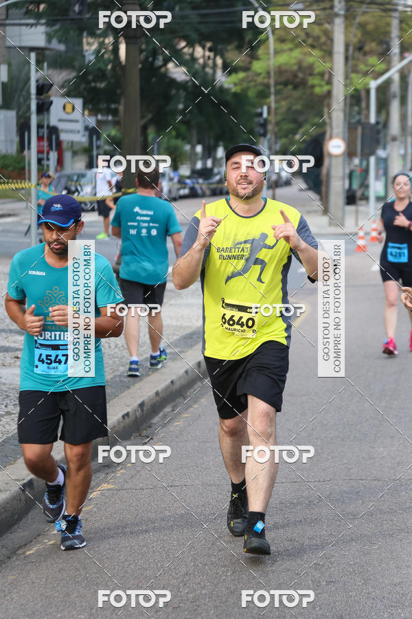 Buy your photos of the eventMeia Maratona Internacional de Curitiba 2018 on Fotop