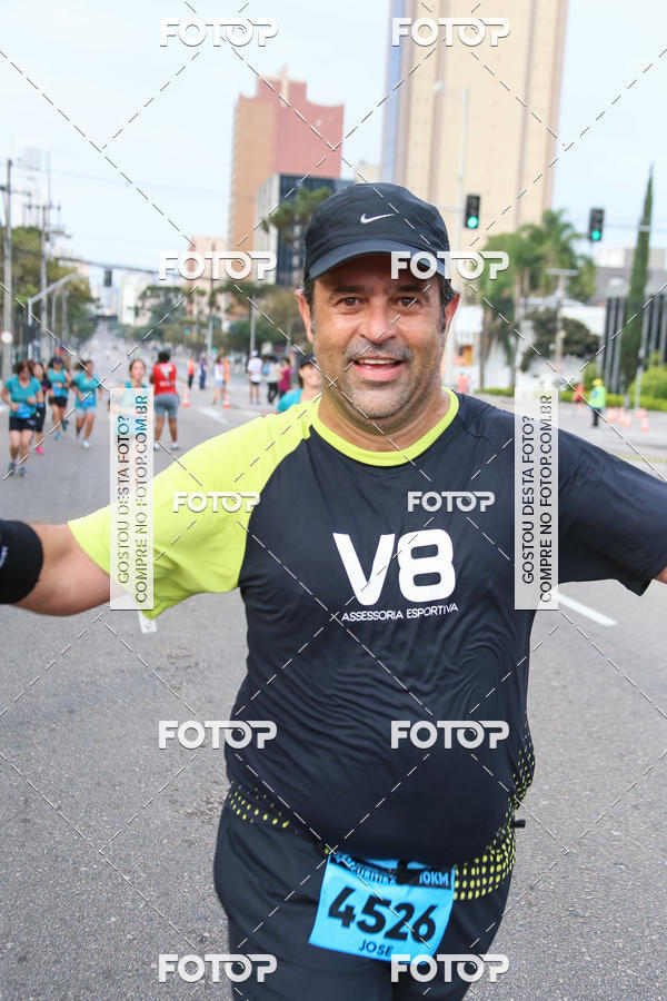 Buy your photos of the eventMeia Maratona Internacional de Curitiba 2018 on Fotop