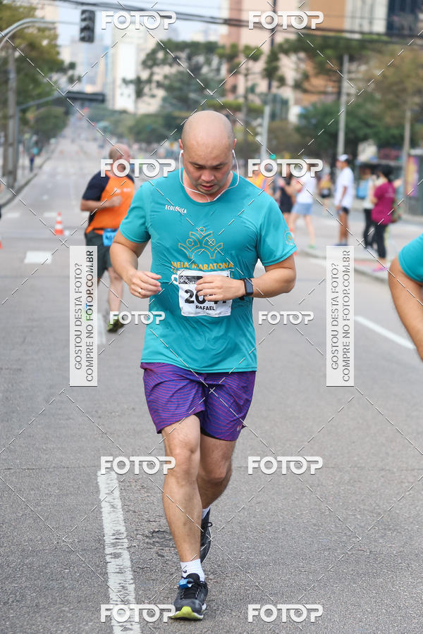Buy your photos of the eventMeia Maratona Internacional de Curitiba 2018 on Fotop