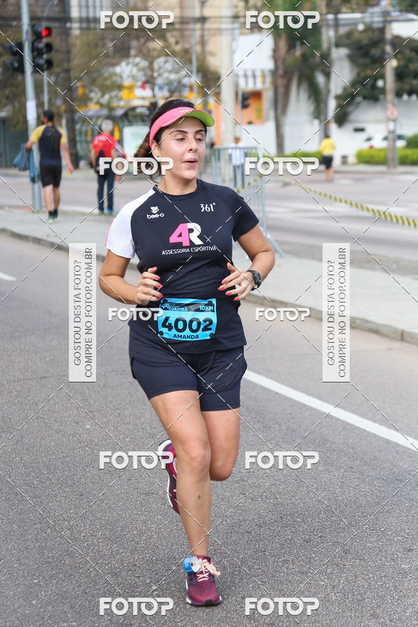 Buy your photos of the eventMeia Maratona Internacional de Curitiba 2018 on Fotop