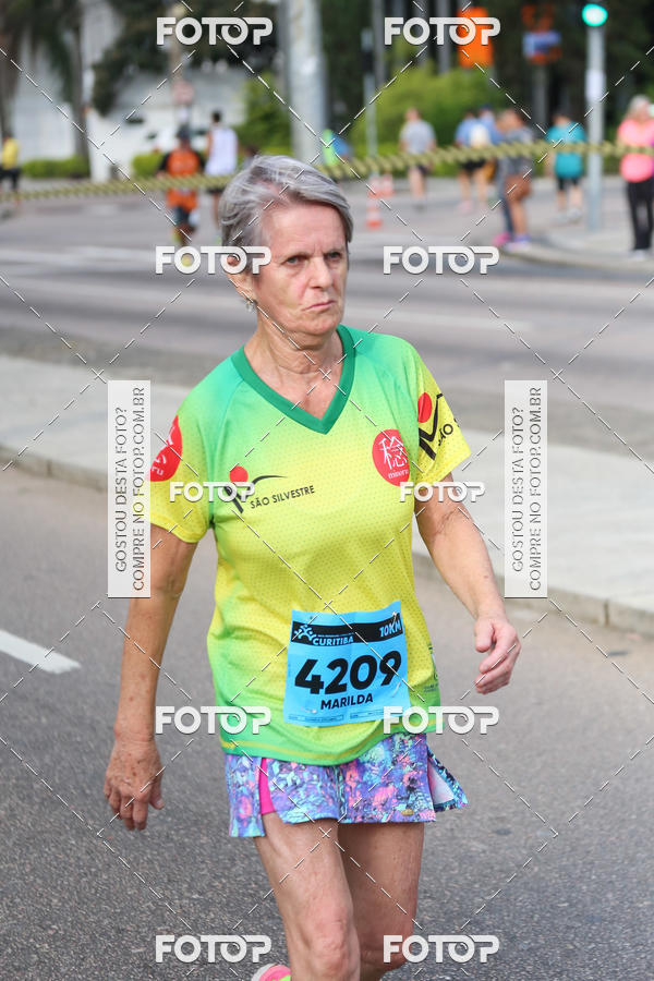 Buy your photos of the eventMeia Maratona Internacional de Curitiba 2018 on Fotop