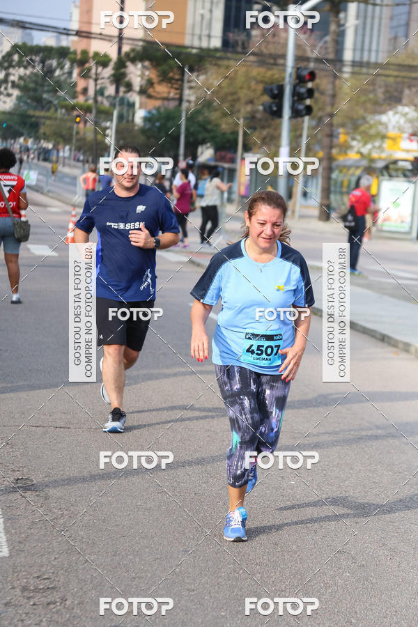 Buy your photos of the eventMeia Maratona Internacional de Curitiba 2018 on Fotop