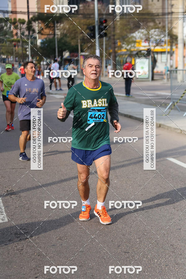 Buy your photos of the eventMeia Maratona Internacional de Curitiba 2018 on Fotop