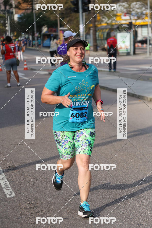 Buy your photos of the eventMeia Maratona Internacional de Curitiba 2018 on Fotop