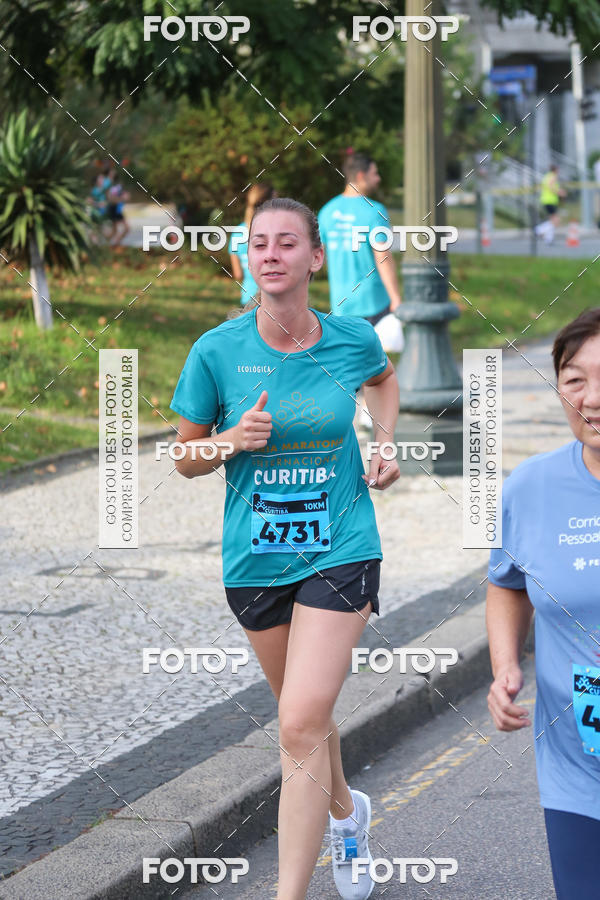 Buy your photos of the eventMeia Maratona Internacional de Curitiba 2018 on Fotop