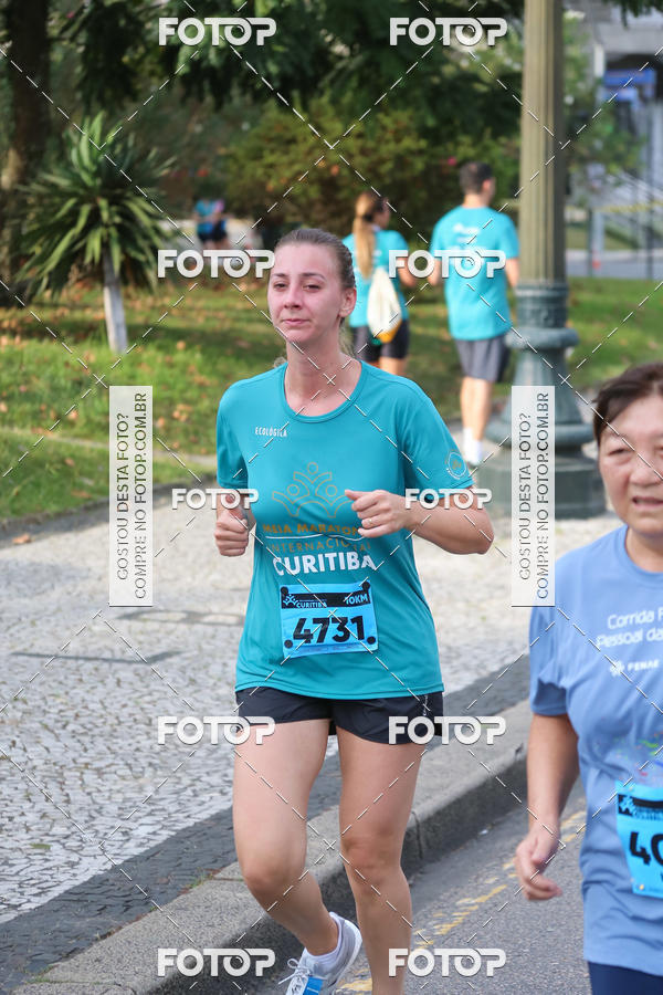 Buy your photos of the eventMeia Maratona Internacional de Curitiba 2018 on Fotop