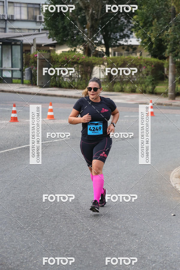 Buy your photos of the eventMeia Maratona Internacional de Curitiba 2018 on Fotop