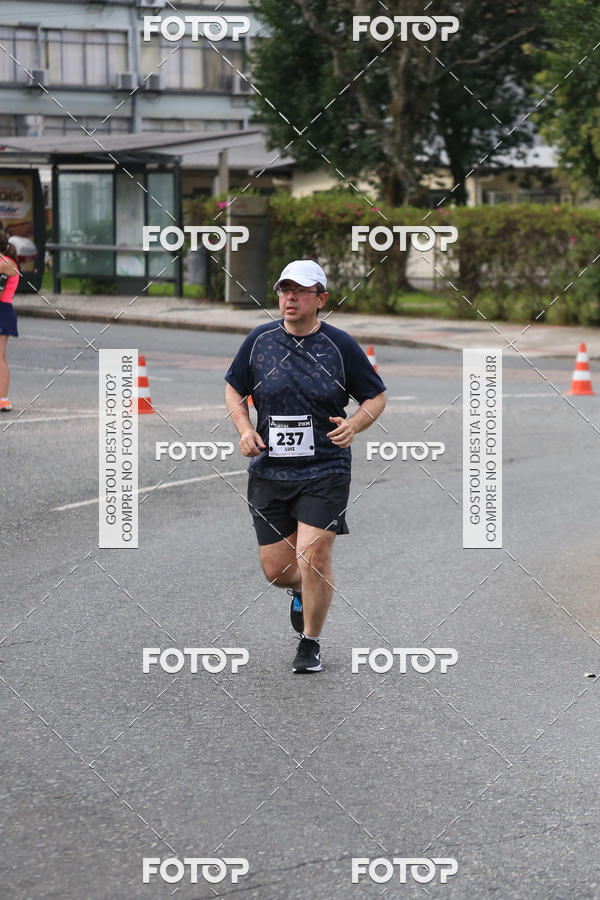 Buy your photos of the eventMeia Maratona Internacional de Curitiba 2018 on Fotop
