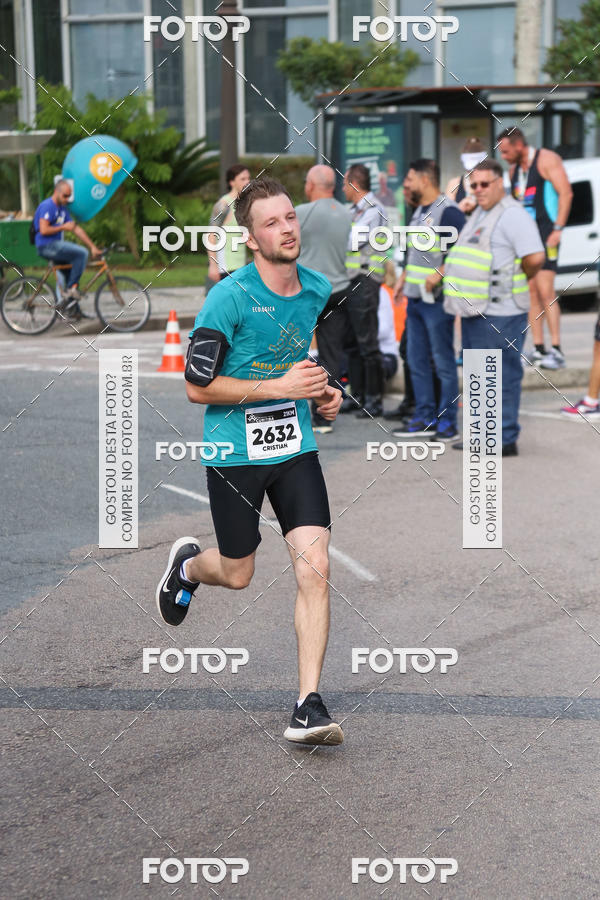 Buy your photos of the eventMeia Maratona Internacional de Curitiba 2018 on Fotop