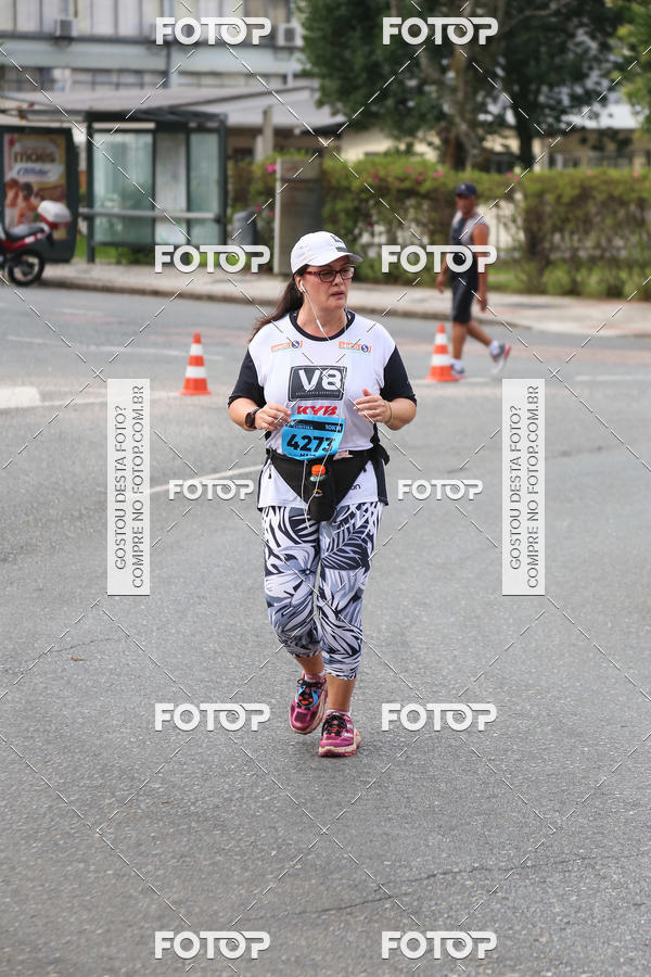 Buy your photos of the eventMeia Maratona Internacional de Curitiba 2018 on Fotop