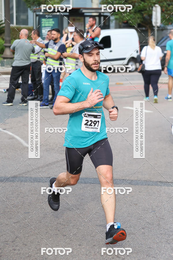 Buy your photos of the eventMeia Maratona Internacional de Curitiba 2018 on Fotop