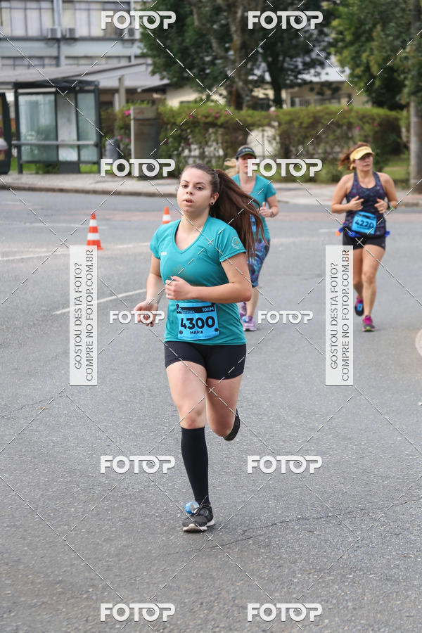 Buy your photos of the eventMeia Maratona Internacional de Curitiba 2018 on Fotop