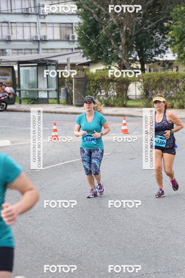 Buy your photos of the eventMeia Maratona Internacional de Curitiba 2018 on Fotop