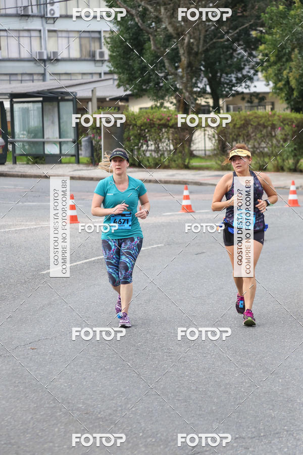 Buy your photos of the eventMeia Maratona Internacional de Curitiba 2018 on Fotop