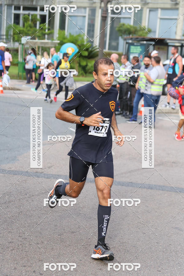 Buy your photos of the eventMeia Maratona Internacional de Curitiba 2018 on Fotop