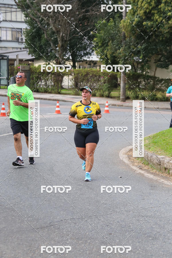 Buy your photos of the eventMeia Maratona Internacional de Curitiba 2018 on Fotop