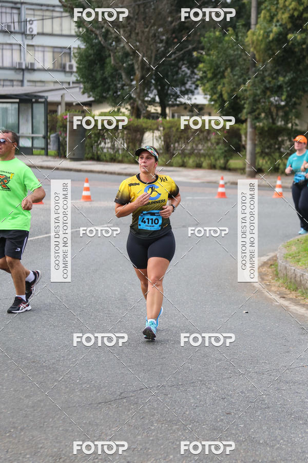 Buy your photos of the eventMeia Maratona Internacional de Curitiba 2018 on Fotop