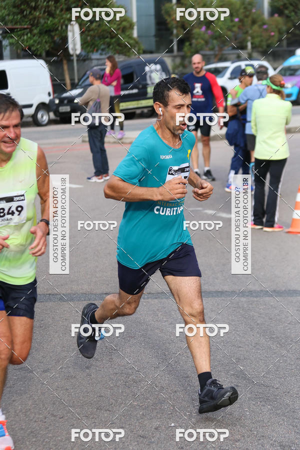 Buy your photos of the eventMeia Maratona Internacional de Curitiba 2018 on Fotop