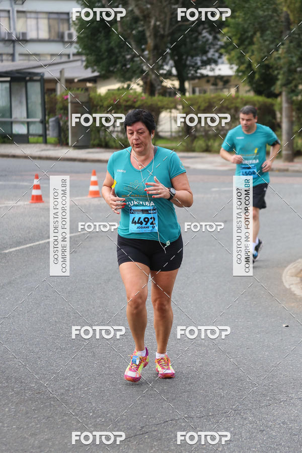 Buy your photos of the eventMeia Maratona Internacional de Curitiba 2018 on Fotop