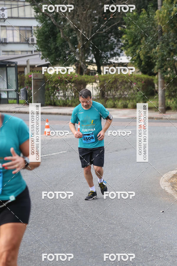 Buy your photos of the eventMeia Maratona Internacional de Curitiba 2018 on Fotop