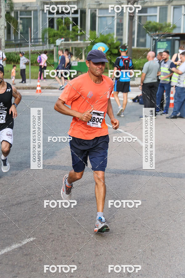 Buy your photos of the eventMeia Maratona Internacional de Curitiba 2018 on Fotop