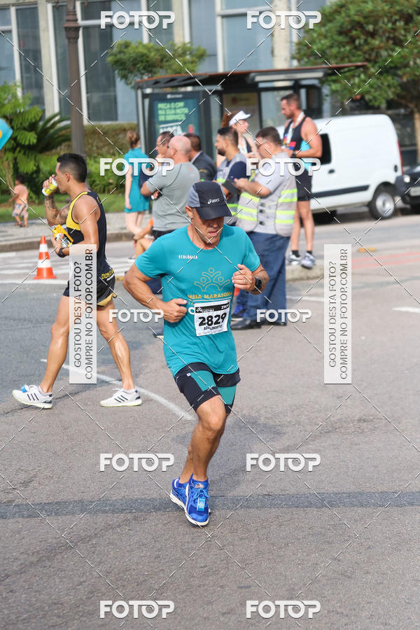 Buy your photos of the eventMeia Maratona Internacional de Curitiba 2018 on Fotop