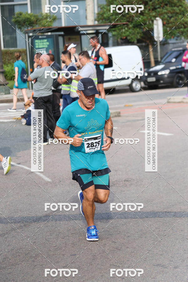 Buy your photos of the eventMeia Maratona Internacional de Curitiba 2018 on Fotop