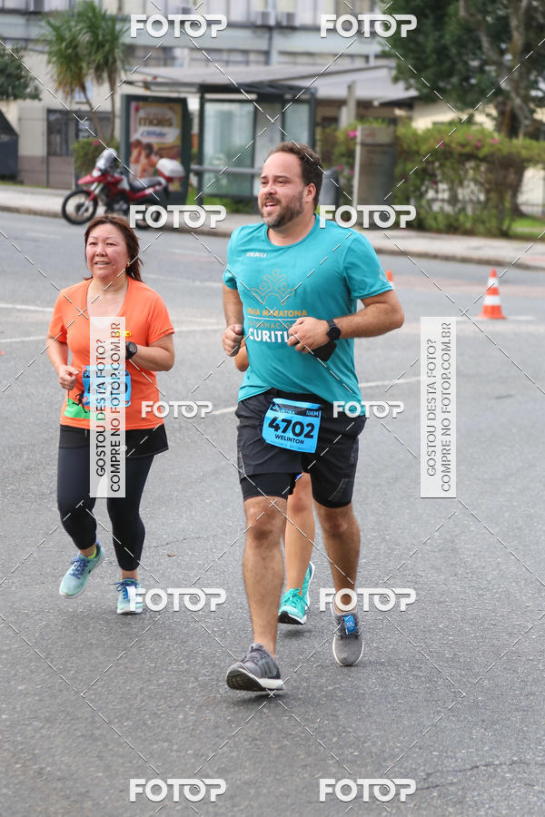 Buy your photos of the eventMeia Maratona Internacional de Curitiba 2018 on Fotop