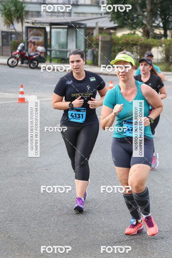 Buy your photos of the eventMeia Maratona Internacional de Curitiba 2018 on Fotop